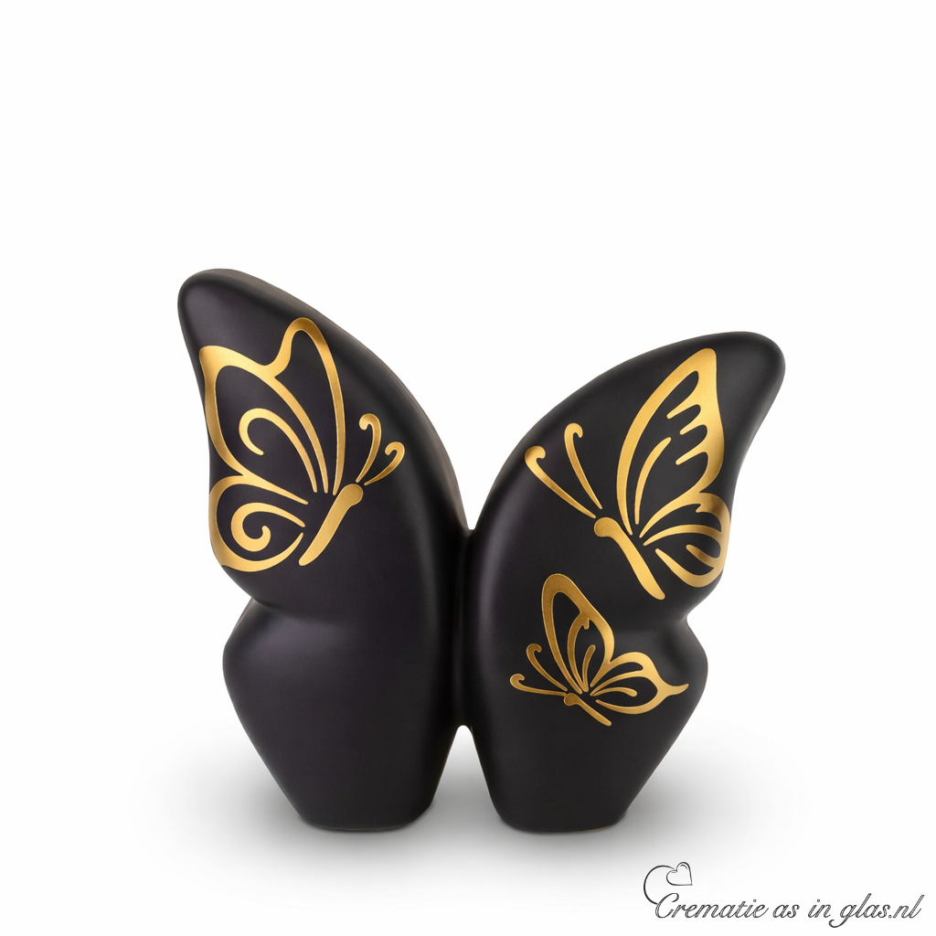 Zwarte keramische vlinder urn met goudfolie vlinders. Geschikt voor crematie-as.
